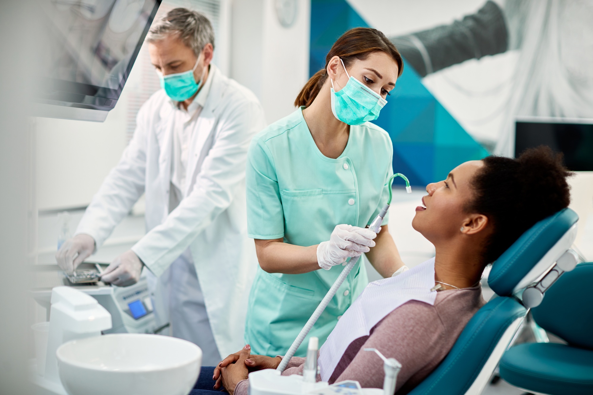 african-american-woman-having-dental-treatment-at-dentist-s-office-.jpg